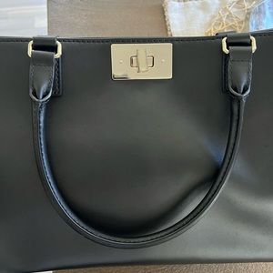 Kate Spade Tote. Never used. Been sitting on my shelf.